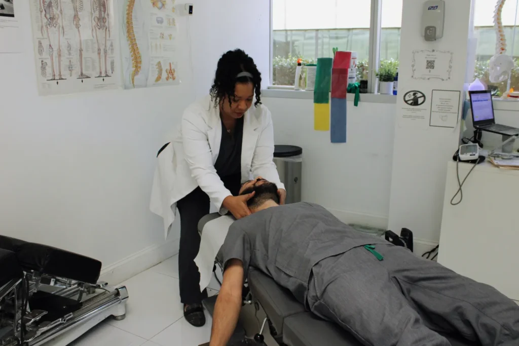 A licensed Miami Chiropractor providing chiropractic adjustment